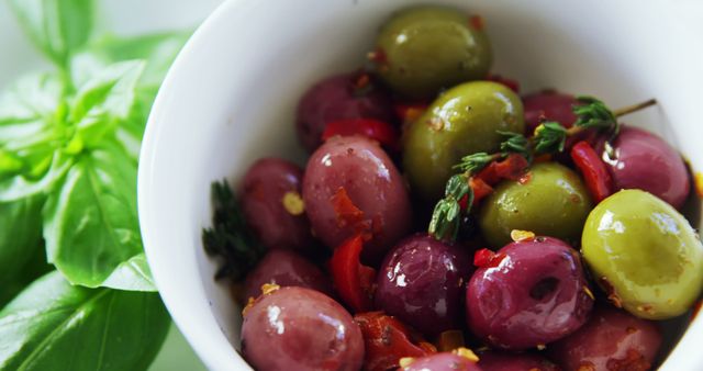 Bowl of Fresh Marinated Olives with Herbs and Peppers - Download Free Stock Images Pikwizard.com