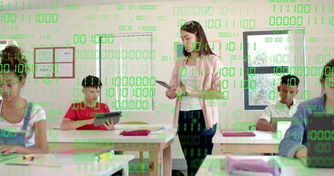 Teacher holding tablet, students using tablets with green binary overlay in classroom