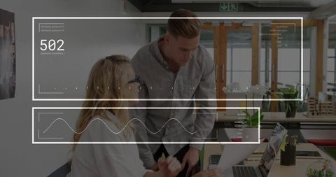 Collaborating in Modern Open-Plan Office with Digital Interface Overlay