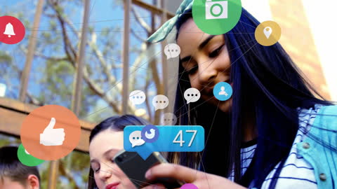 Teen Connecting with Social Media Icons Floating Around