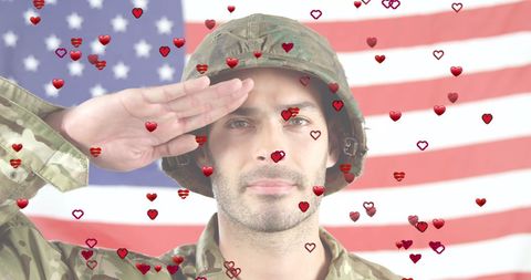 Soldier Saluting With Patriotic Heart Overlay and American Flag
