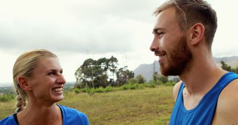Joyful Couple Conversing During Scenic Hike