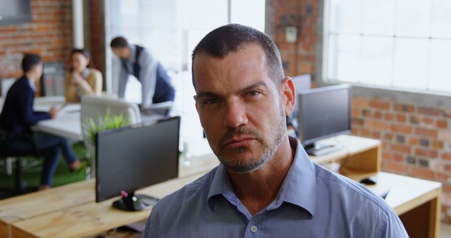 Confident Businessman Standing in Contemporary Office - Download Free Stock Images Pikwizard.com