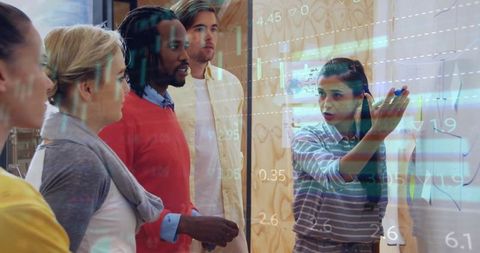 Diverse Team Brainstorming With Digital Data Overlays in Modern Office