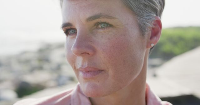 Portrait of Mature Woman with Short Hair Reflecting Outdoors - Download Free Stock Images Pikwizard.com