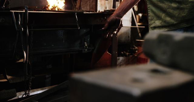 Blacksmith Working Metal in Foundry - Download Free Stock Images Pikwizard.com