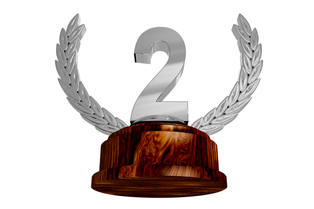 Transparent Second Place Trophy with Wooden Base and Metallic Wings - Download Free Stock Videos Pikwizard.com