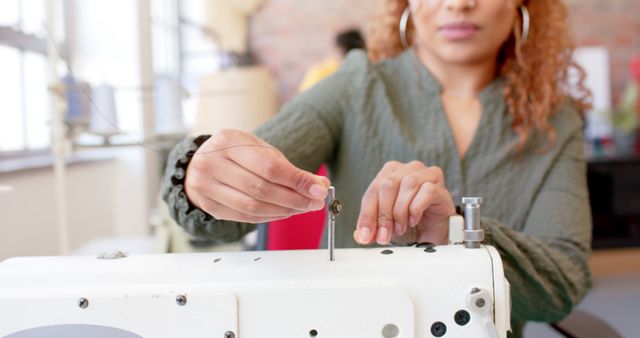 Female Seamstress Threading Sewing Machine Needle - Download Free Stock Images Pikwizard.com