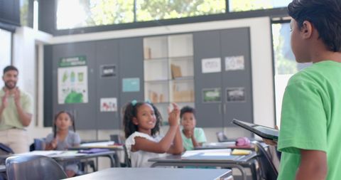 Confident Biracial Student Presenting in Classroom Setting - Download Free Stock Images Pikwizard.com