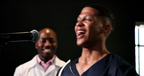 Joyful doctor recognized for excellence at award ceremony