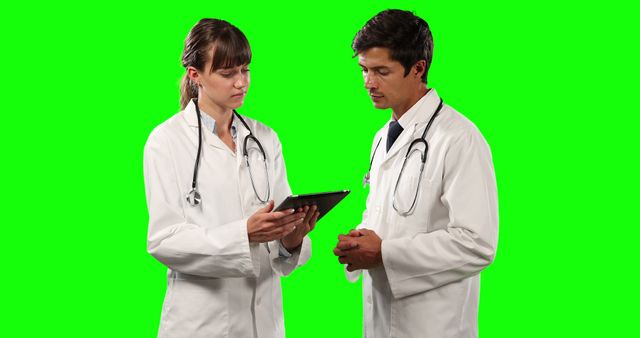 Doctors Collaborating on Digital Tablet Against Green Screen - Download Free Stock Images Pikwizard.com