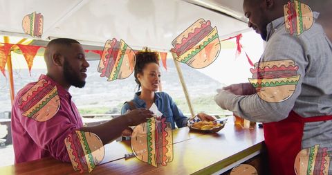Smiling Customers at Friends Food Truck Stall Illustrating Happiness