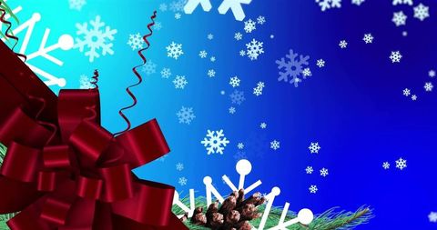 Festive red satin bow with pinecones and snowflakes on blue gradient for holiday banners