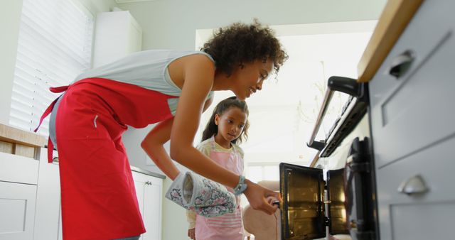 Mother and Daughter Working Together in Kitchen Baking Cookies - Download Free Stock Images Pikwizard.com