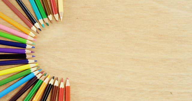 Array of Colored Pencils on Wooden Background - Download Free Stock Images Pikwizard.com