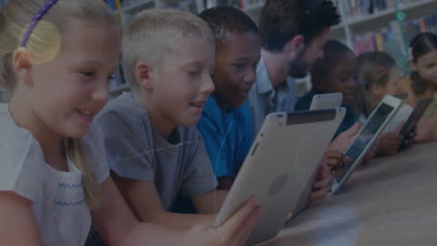 Children Engaging with Tablets in Diverse Classroom Setting