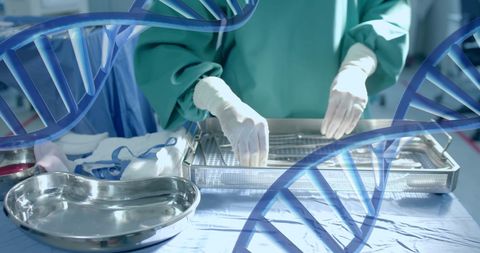 Surgeon preparing instruments in operating room with dna overlay