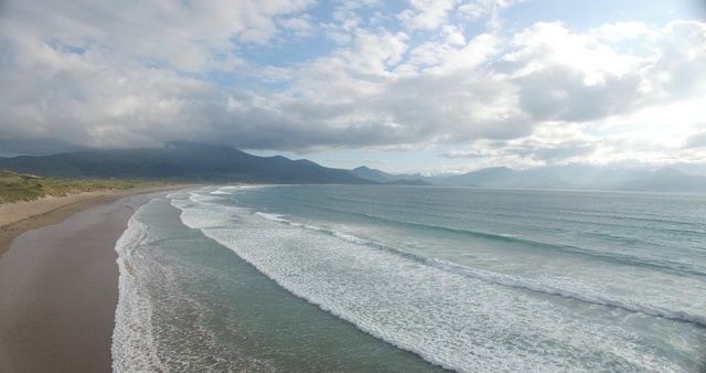 Transparent Waves Rolling On Cloudy Sky Beach - Download Free Stock Videos Pikwizard.com