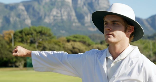 Cricket Umpire Signaling on Field at Outdoor Match - Download Free Stock Images Pikwizard.com