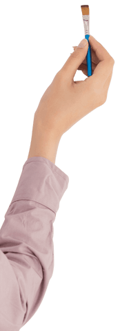 Hand holding paintbrush on transparent background for art and creativity