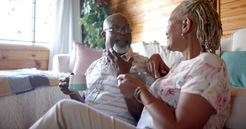 Senior African American Couple Relaxing and Enjoying Coffee at Home - Download Free Stock Images Pikwizard.com