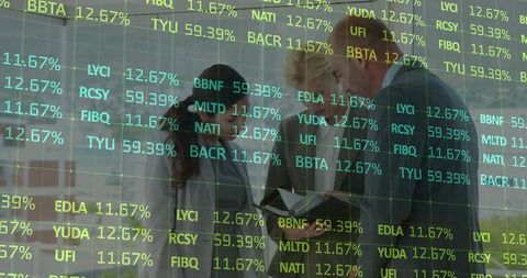 Executives reviewing financial reports with live stock ticker overlay in modern glass office