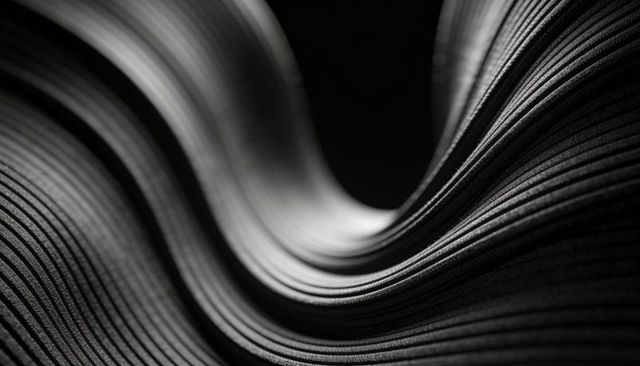 Ribbed Pleated Textile Forming Sculptural Wave Curves Studio-Lit Monochrome Macro Texture