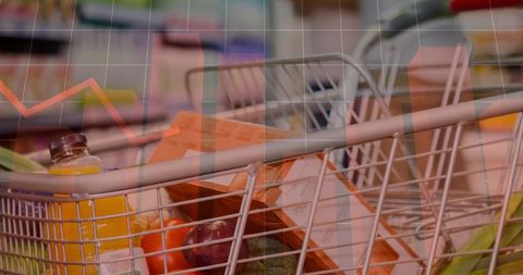 Shopping cart packed with groceries showing retail data and market trend overlay