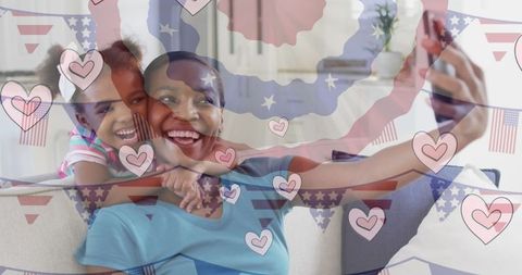 Mother and Daughter Taking a Cheerful Selfie with Digital Heart Overlay