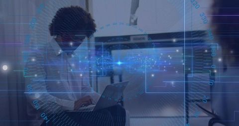 Business traveler working on laptop in airplane cabin with holographic interface overlay