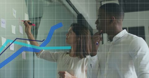 Business Team Analyzing Financial Growth Data in Modern Office