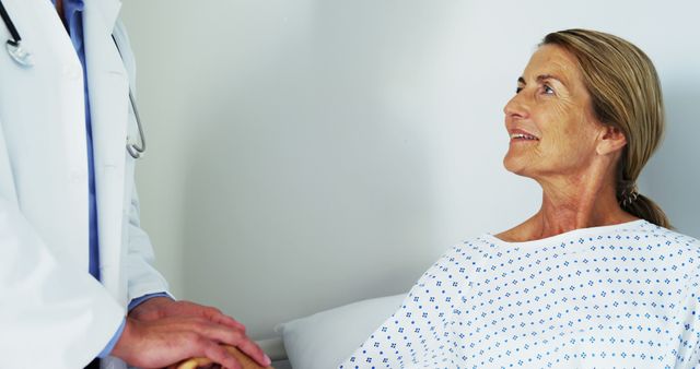 Female Patient Engaging with Doctor in Hospital - Download Free Stock Images Pikwizard.com