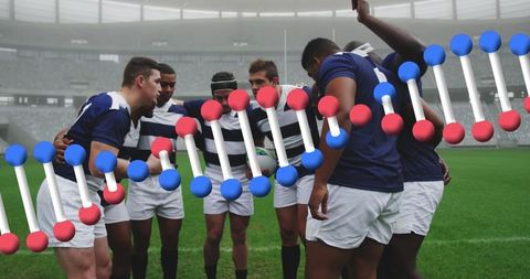 Rugby Players in Strategy Huddle with DNA Strand Overlay