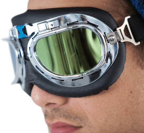 Close up of young man wearing vintage aviator goggles on transparent background