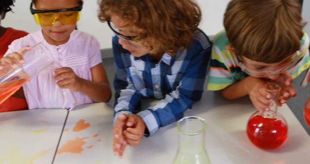 Children Conducting Science Experiment with Colorful Liquids in Laboratory - Download Free Stock Images Pikwizard.com