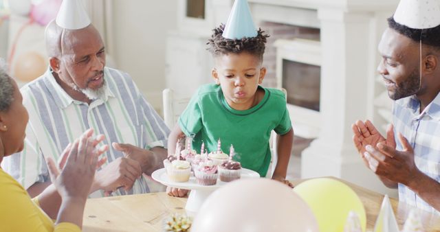 Joyful African American Family Birthday Celebration for Young Boy - Download Free Stock Images Pikwizard.com