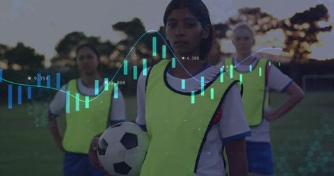 Young female soccer players training with data overlay