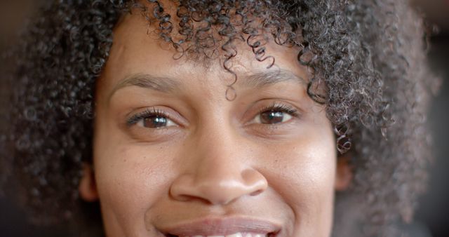Smiling Woman with Curly Hair Close-Up Portrait - Download Free Stock Images Pikwizard.com