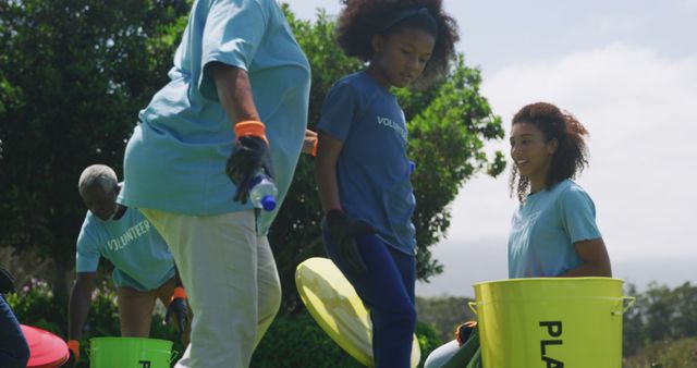 Diverse Volunteers Sorting Waste in Park on Sunny Day - Download Free Stock Images Pikwizard.com