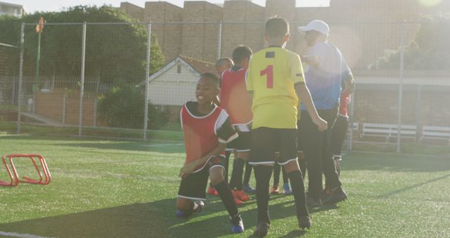 Young Soccer Players Training on Field with Coach - Download Free Stock Images Pikwizard.com