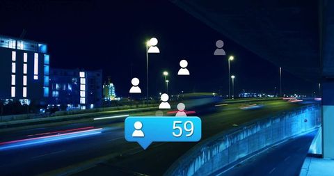 Nighttime Cityscape with Social Media Notifications Over Busy Highway