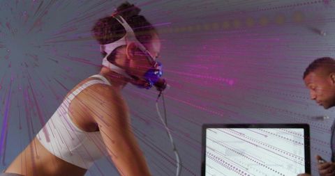 Woman on Exercise Bike Performing Aerobic Fitness Assessment