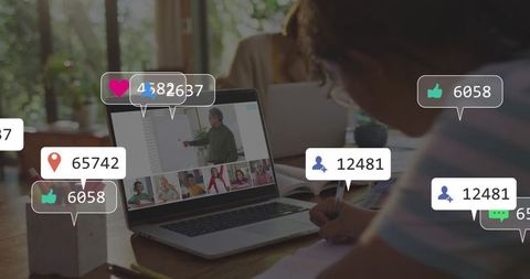 Virtual classroom livestream with student taking notes, teacher presenting, social reactions