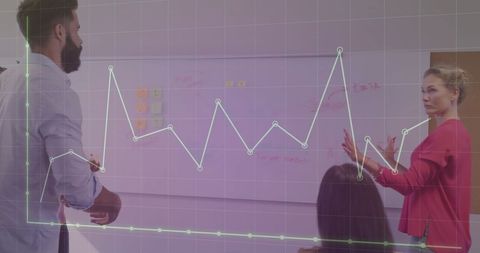 Colleagues Discussing Financial Growth Data in Modern Office - Download Free Stock Images Pikwizard.com