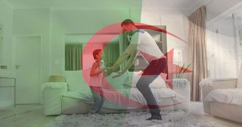 Dad playing with daughter on rug in bright living room with crescent star overlay