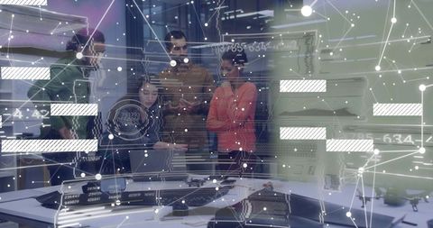 Cross-functional team collaborating over laptop analyzing AI data overlay in modern tech lab