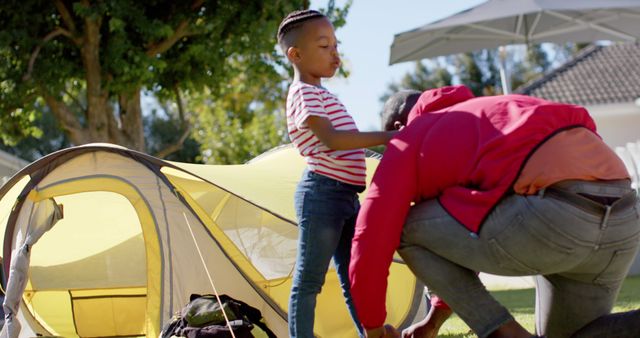 Family Bonding While Setting Up Tent Outdoors - Download Free Stock Images Pikwizard.com