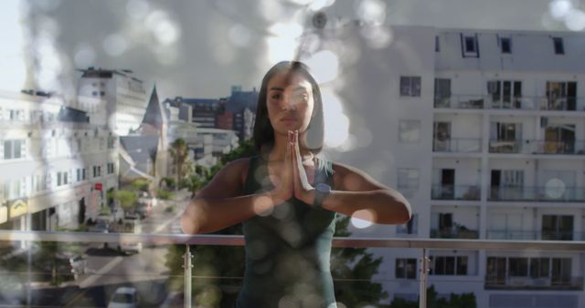 Woman Practicing Yoga on Balcony Overlooking Urban Cityscape - Download Free Stock Images Pikwizard.com