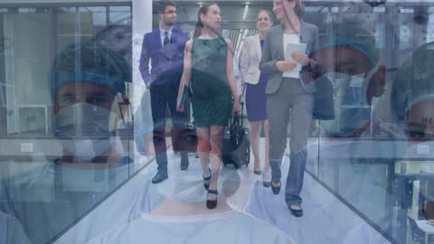 Healthcare Professionals Overlaid on Business Team Concept