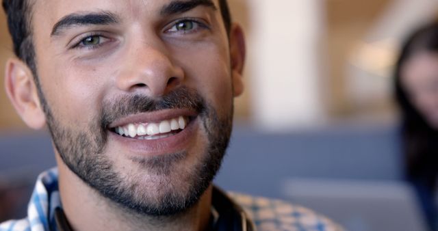 Close-up of a Smiling Man with Beard in Casual Attire - Download Free Stock Images Pikwizard.com